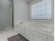 Relaxing bathroom with a large garden tub and separate shower at 3975 Mcconnell Rd, Cumming, GA 30028