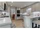 Modern kitchen with stainless steel appliances and light gray cabinets at 3975 Mcconnell Rd, Cumming, GA 30028