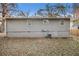 Rear view of house, showcasing gray siding and a large yard at 193 Polar Rock Sw Rd, Atlanta, GA 30315
