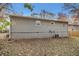 Rear view of house, showcasing gray siding and a large yard at 193 Polar Rock Sw Rd, Atlanta, GA 30315