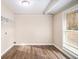 Laundry room with vinyl flooring and ample storage at 193 Polar Rock Sw Rd, Atlanta, GA 30315