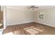 Spacious bedroom with hardwood floors and neutral walls at 4252 Lamar St, Decatur, GA 30035