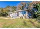 Brick ranch home with a landscaped yard and walkway at 4252 Lamar St, Decatur, GA 30035