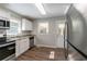 Kitchen with granite countertops and stainless steel appliances at 4252 Lamar St, Decatur, GA 30035