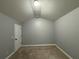 Large bedroom with vaulted ceiling and neutral walls at 1244 St James Pl, Loganville, GA 30052