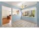 Breakfast nook with light blue walls and view of backyard at 470 Gray Herron Ct, Lawrenceville, GA 30044