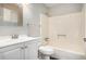 Bathroom with white vanity and tub shower combo at 676 Tarkington S Rd, Stone Mountain, GA 30088