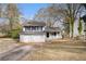 Charming ranch home with a two-car garage and well-manicured lawn at 676 Tarkington S Rd, Stone Mountain, GA 30088