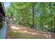 Large backyard with wooded area and a peaceful view at 1166 Fords Lake Nw Pl, Acworth, GA 30101