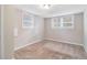 Spacious bedroom with neutral carpeting and window at 3986 Holland Dr, Douglasville, GA 30135