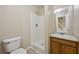 Clean bathroom with shower and wood vanity at 6101 Hickory Lane Dr, Union City, GA 30291