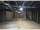 Unfinished basement with framed walls and exposed ceiling at 1206 St James Pl, Loganville, GA 30052