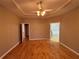 Large bedroom with hardwood floors, access to bathroom and additional room at 1206 St James Pl, Loganville, GA 30052