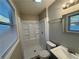 Clean bathroom with shower, toilet, and vanity at 5423 Pine Valley Dr, Union City, GA 30291