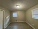 Well-lit bedroom with two windows and new flooring at 5423 Pine Valley Dr, Union City, GA 30291