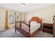 Charming bedroom with double windows and a wooden bed frame at 431 Spring Gate Rd, Stone Mountain, GA 30087