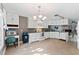 White kitchen with ample cabinet space and view to backyard at 839 Post Road Way, Stone Mountain, GA 30088