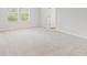 Spacious bedroom with plush carpeting at 7065 Brushwood Bnd, Lithonia, GA 30058