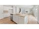 Kitchen island with granite countertops and stainless steel appliances at 7065 Brushwood Bnd, Lithonia, GA 30058