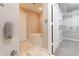 Bathroom with soaking tub and access to walk-in closet at 2626 Peachtree Nw Rd # 412, Atlanta, GA 30305