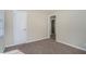 Bedroom with neutral carpeting and access to another room at 2361 Bonner Rd, Atlanta, GA 30344