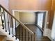 View of dining room from entryway with wood-look flooring and large window at 115 Boxford Ct, Johns Creek, GA 30022