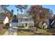 Two-story house with gray siding and a wreath on the door at 115 Boxford Ct, Johns Creek, GA 30022