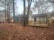 Home with deck and wooded backyard at 1312 Buttercup Ct, Lawrenceville, GA 30044