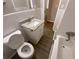 Updated bathroom with granite vanity, white tile, and bathtub at 2490 Brentwood Rd, Decatur, GA 30032