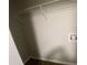 Small laundry room with wire shelving and hookups at 2490 Brentwood Rd, Decatur, GA 30032