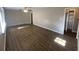 Bright living room with neutral walls and wood-look flooring at 2490 Brentwood Rd, Decatur, GA 30032