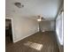 Spacious living room with hardwood floors and ceiling fan at 2490 Brentwood Rd, Decatur, GA 30032