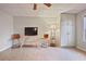 Finished basement with tile flooring and a TV area at 260 Wildcat Lake Dr, Lawrenceville, GA 30043