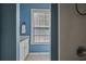 Simple bathroom with shower/tub combo and window at 260 Wildcat Lake Dr, Lawrenceville, GA 30043