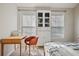 Bright bedroom with built-in shelving and window light at 260 Wildcat Lake Dr, Lawrenceville, GA 30043