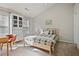 Cozy bedroom with a queen bed and a built-in cabinet at 260 Wildcat Lake Dr, Lawrenceville, GA 30043