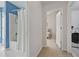 Hallway with access to bathroom, bedroom, and laundry at 260 Wildcat Lake Dr, Lawrenceville, GA 30043