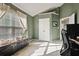 Bright home office features built-in shelving and window light at 260 Wildcat Lake Dr, Lawrenceville, GA 30043
