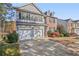 Two-story house with a double garage and attractive landscaping at 260 Wildcat Lake Dr, Lawrenceville, GA 30043