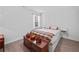 Cozy bedroom with a comfortable bed, decorated with fall-themed pumpkins at 691 Cordele Ln, Sugar Hill, GA 30518