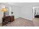 A simple home office with a desk, chair, and window, ideal for working at 691 Cordele Ln, Sugar Hill, GA 30518