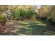 Backyard with soccer goal and lush greenery at 2764 Carrie Nw Dr, Kennesaw, GA 30144