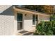 House entrance with a dark brown door and storm door at 2764 Carrie Nw Dr, Kennesaw, GA 30144