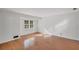 Hardwood floor bedroom with a window and neutral wall color at 5440 Tally Green Dr, Marietta, GA 30068