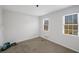 Simple bedroom with hardwood floors and neutral walls at 5440 Tally Green Dr, Marietta, GA 30068