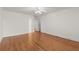 Spacious bedroom with hardwood floors and white walls at 15 Downshire Ln, Decatur, GA 30033