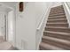 Carpeted staircase leading to the upper level at 15 Downshire Ln, Decatur, GA 30033