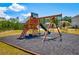 Wooden playground set with swings and slide in a community area at 571 Wagon Hill Ln, Sugar Hill, GA 30518