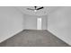 Bright bedroom featuring ceiling fan and wall-to-wall carpet at 3070 Branford Ct, Marietta, GA 30062