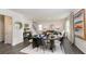 Bright dining area with dark wood table and six chairs, near the kitchen at 4074 Fairlady Ct, Kennesaw, GA 30144